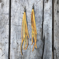 GOLDEN LEATHER TASSEL EARRINGS
