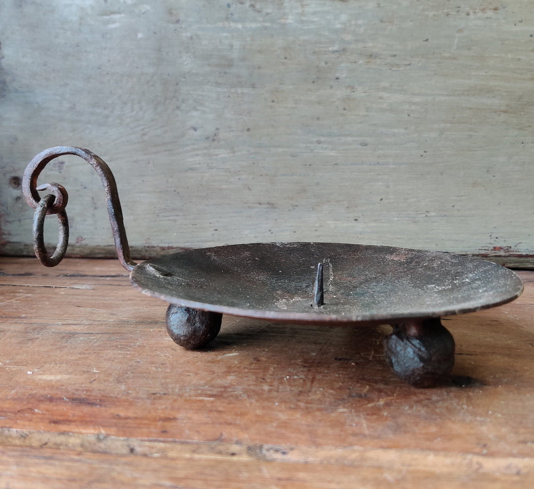 CAST IRON THREE BALL CANDLESTAND