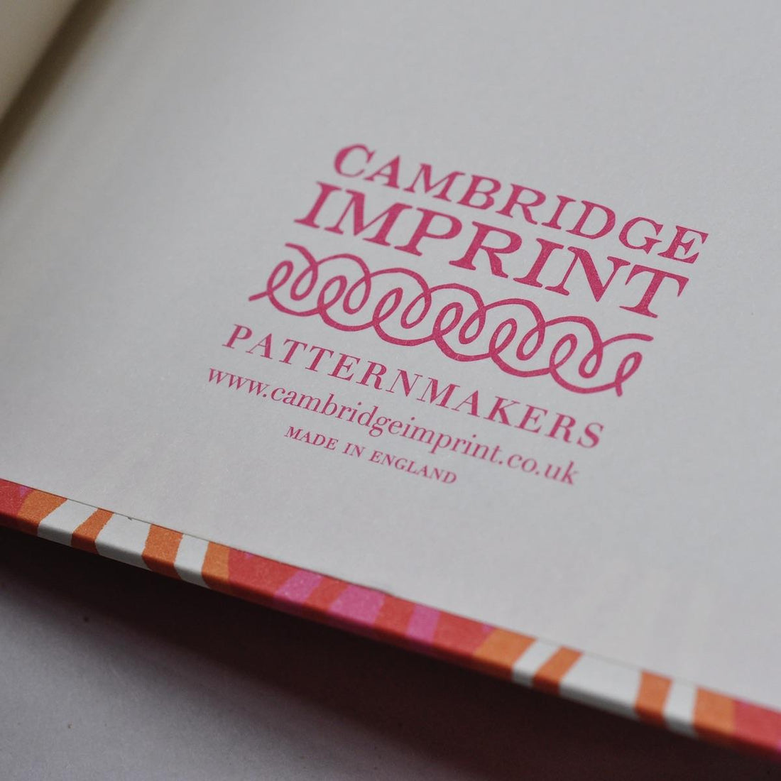 CAMBRIDGE IMPRINT HARDBACK NOTEBOOK | THREADWORK BRIGHT PINK & ORANGE