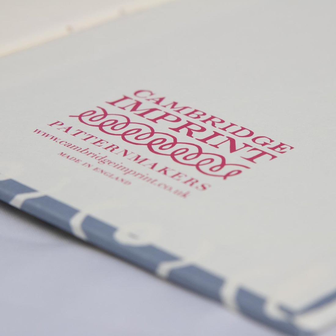 CAMBRIDGE IMPRINT HARDBACK NOTEBOOK | PERSEPHONE CORNFLOWER & RED