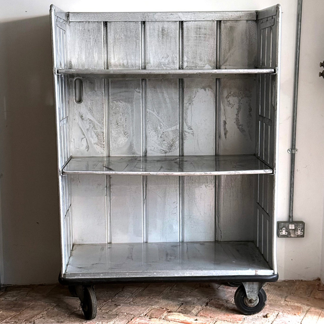 VINTAGE ALUMINIUM SHELVING UNIT ON WHEELS