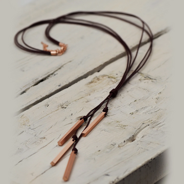 MATT METALLIC AND LEATHER KNOT STRAND NECKLACE