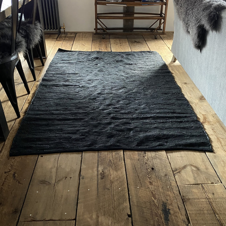 BLACK LEATHER RUG