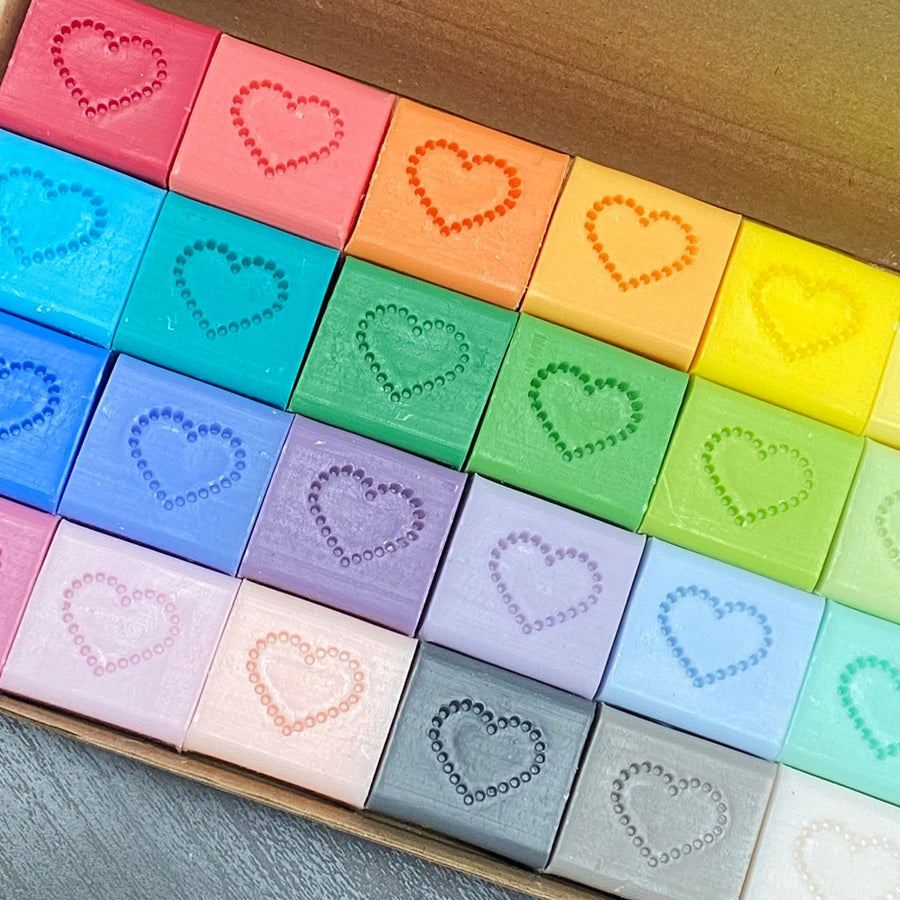 A BOX OF 24 SOAP HEARTS