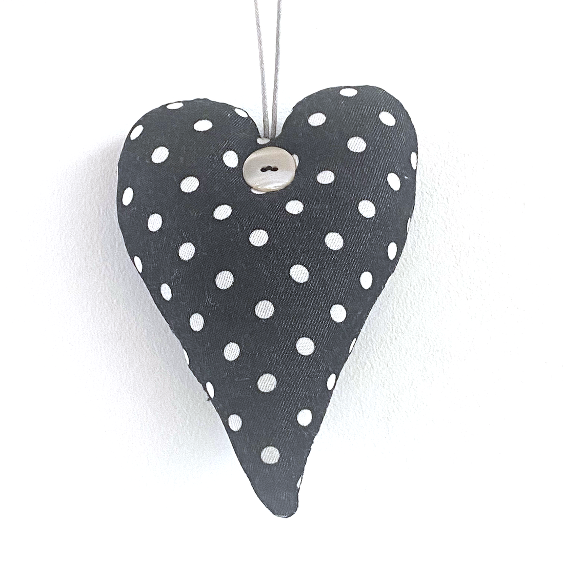 PADDED HEART WITH BUTTON DETAIL