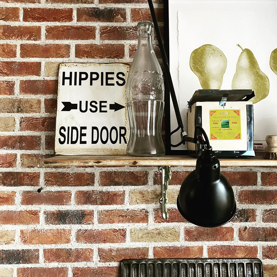 RUSTY METAL SIGN | HIPPIES USE THE SIDE DOOR