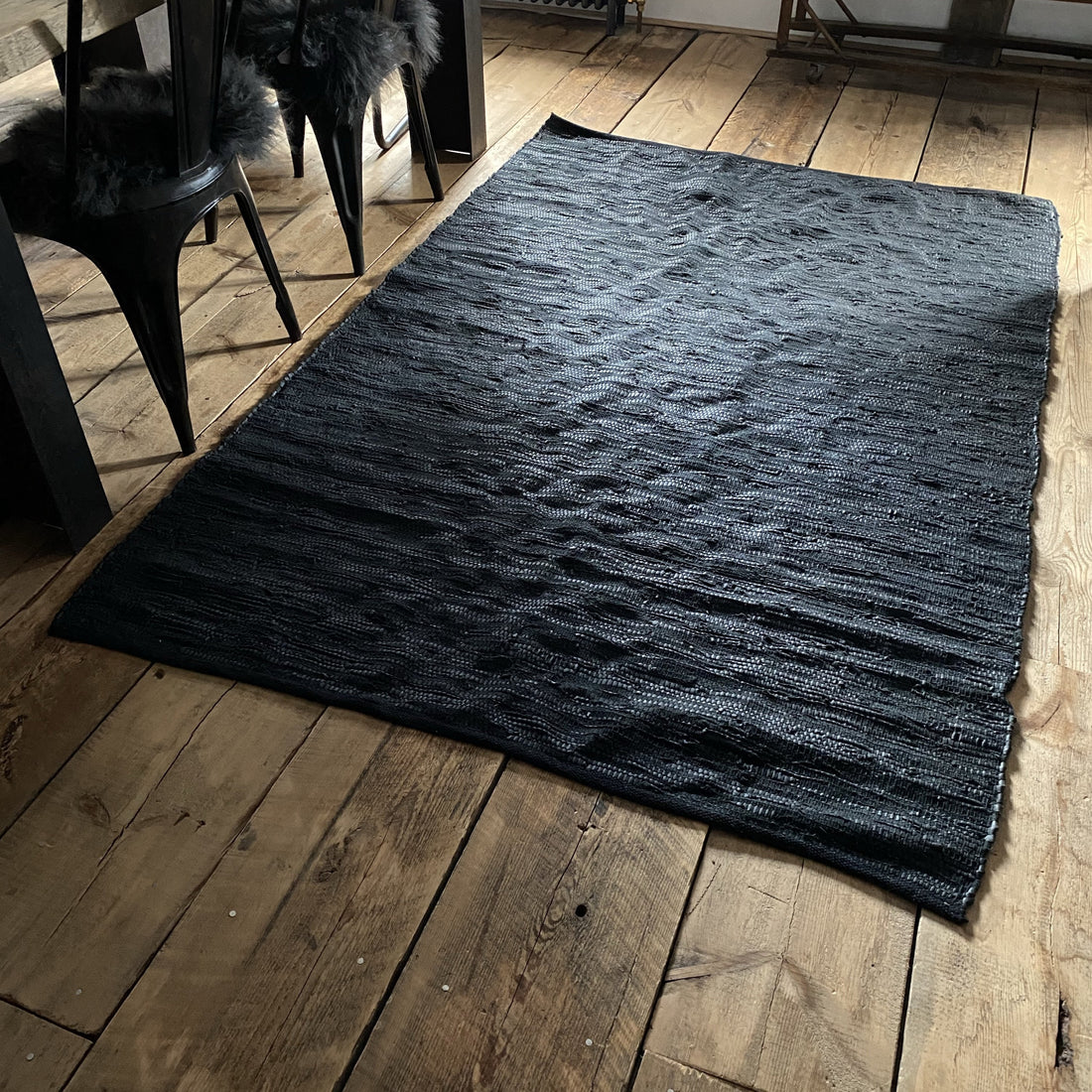 BLACK LEATHER RUG